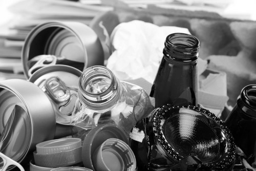 Crew loading commercial rubbish into a refuse vehicle